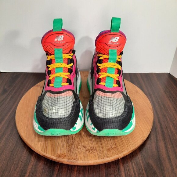 New Balance Pink and Orange Athletic Shoes with Dynamic Design - Picture 2 of 10